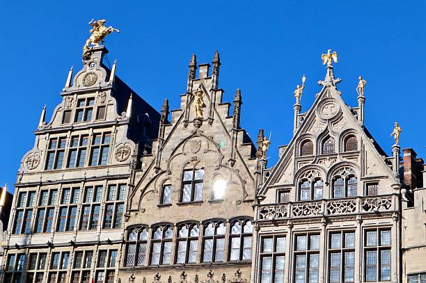 istock Grote Markt guildhalls displaying renaissance architecture and golden statues under a clear blue sky in Antwerp, Belgium 2250085866
