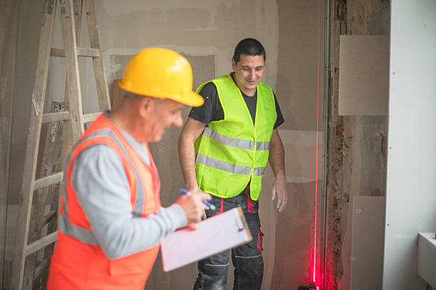 istock A man wearing fluorescent clothing inspects a construction site 2250086499