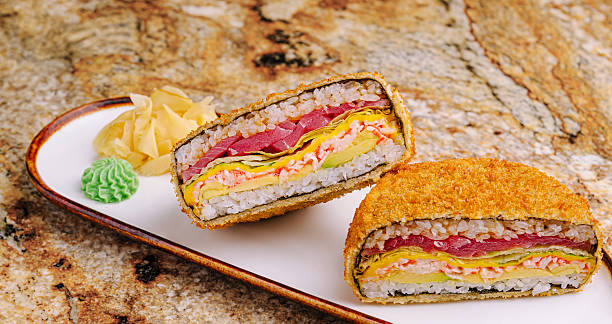 istock Sushi sandwich with crispy coating served on a plate in a modern setting 2250087765
