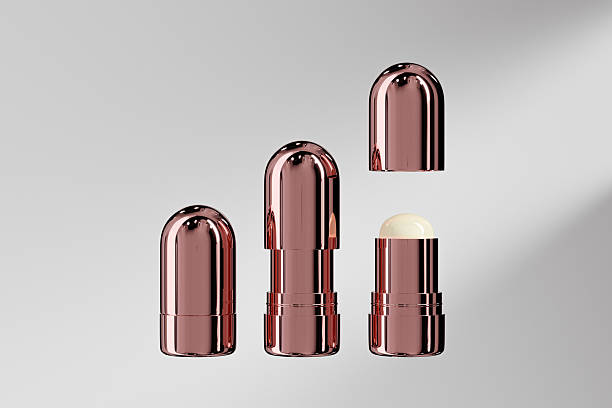 istock rose gold foundation stick mockup, luxury metallic lipstick packaging, gold electroplating makeup twist up tube packaging, Cylindrical Deodorant Packaging, Rotating makeup blush cream container 2250090839