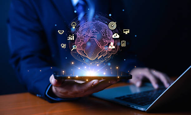 istock A businessman uses a digital tablet displaying a glowing global network with data icons, symbolizing innovation, analytics, and modern technology for business growth in the digital era. 2250093436