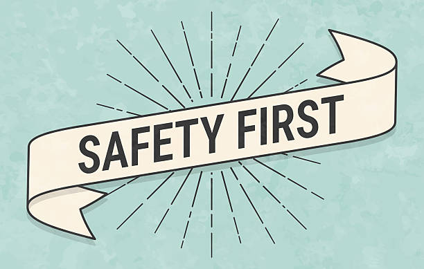 Safety First. Banner, ribbon, label in a trendy vintage style. Beautiful retro ribbon with old textured paper and sunbursts in the background. Colors used: green, blue, beige and black. The banner is beige with a black outline, the sunbursts and the text are black. The background is green-blue. Vector Illustration (EPS file, well layered and grouped). Easy to edit, manipulate, resize or colorize. Vector and Jpeg file of different sizes.