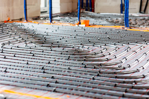 istock Underfloor heating system installation in new house 2250097206