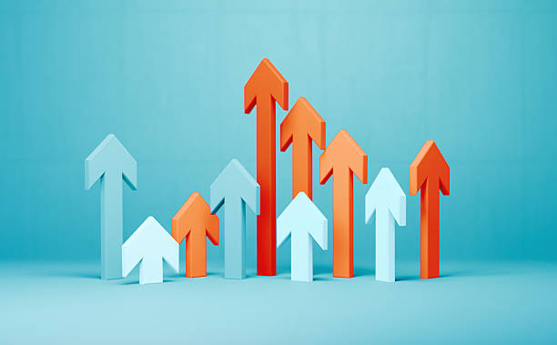 istock Orange And Blue Arrows On Blue Background 2250097353