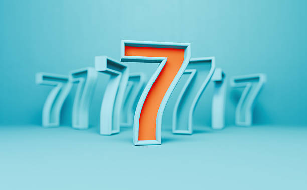 istock Orange And Blue Number 7 On Blue Background 2250097675
