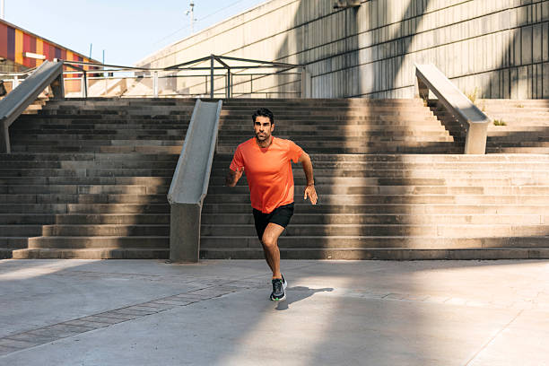 istock Young man running outdoors in morning 2250103387