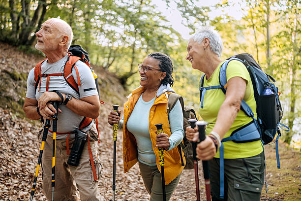 istock Senior friends enjoying a hike in nature 2250106360