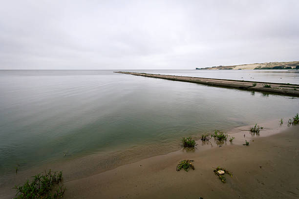 Old concrete pier under a cloudy sky in Nida, Curonian Spit and Curonian Lagoon, Lithuania