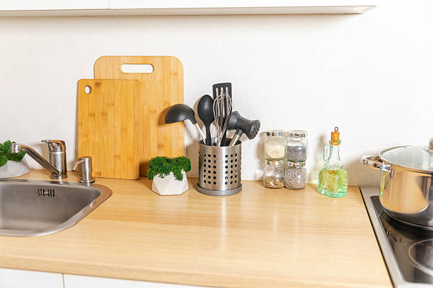 istock Scandinavian classic minimalistic kitchen with white and wooden details. Modern white kitchen clean contemporary style interior design. 2250109321