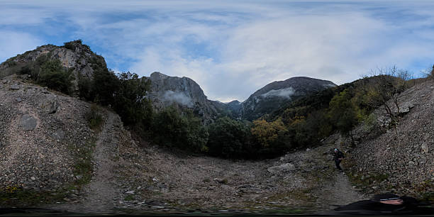 istock Limestone peaks nestle serene river valley in Cantabria 2250112334