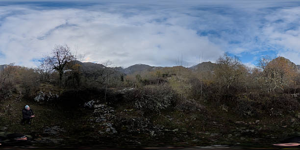 istock Panorama of limestone peaks over a river valley 2250112378