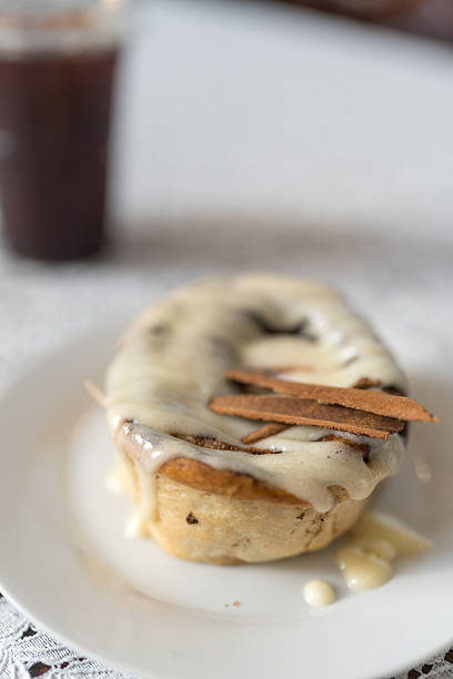 Sweet cinnamon roll baked pastry delicious treat icing swirl bakery food