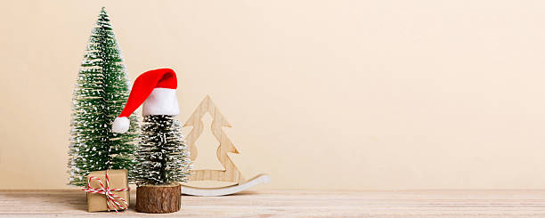 istock Christmas composition. Gifts, small tree, branches and craft DIY decorations on white background. New year concept. Christmas home decoration Flat lay, top view, copy space 2250114745