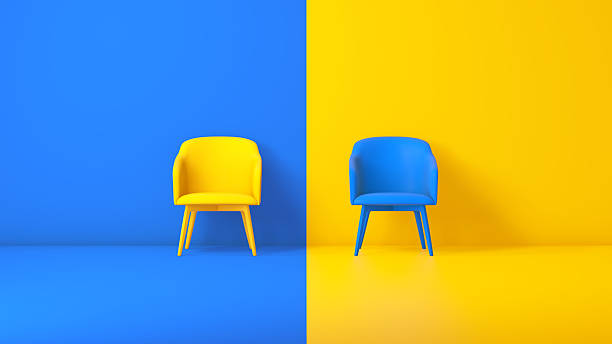 istock Yellow and Blue Chairs in Split-Color Modern Minimalist Studio 2250117326