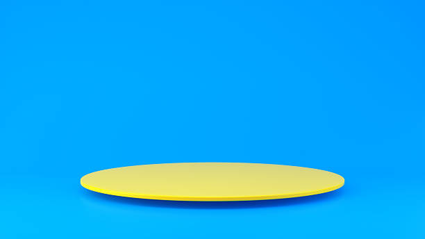 istock Yellow Round Podium on Bright Blue Background Minimal 3D Product Display 2250117404