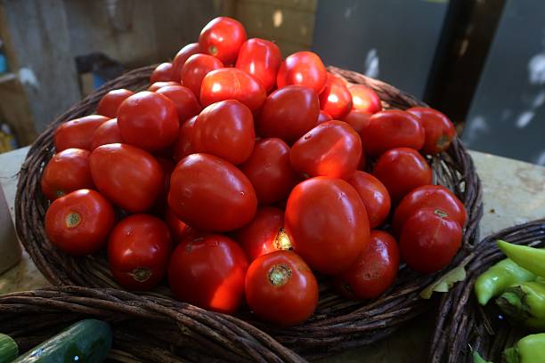 istock Raw ripe red tomato closeup 2250122096