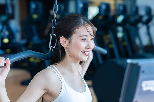 istock Young woman training in the gym 2250123886