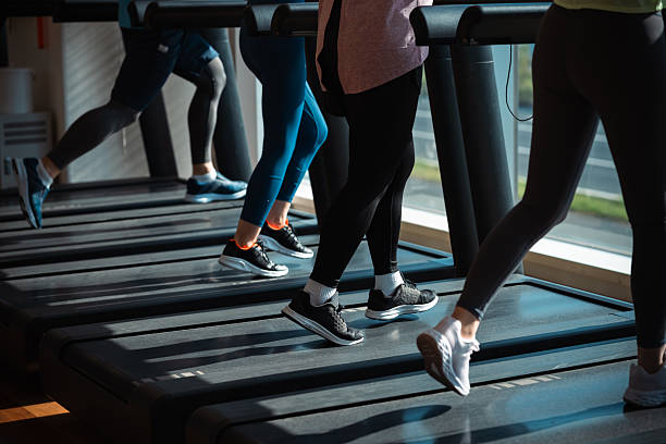 istock Men and women training at the gym 2250126603