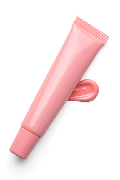 pink lip tint texture, cosmetics beauty product texture, liquid blush, lipstick, lip gloss swatches, package tube on white