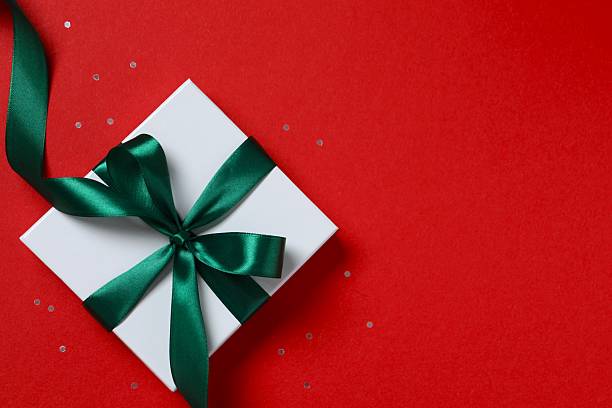 istock Beautiful gift box on color background 2250128713