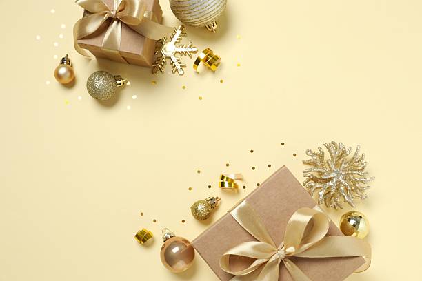 istock Beautiful gift boxes tied with bow and decorations on color background 2250128864