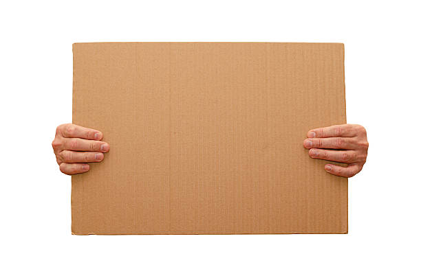 istock Posters of cardboard in his hands. Isolated on white. Copy space. 2250134006