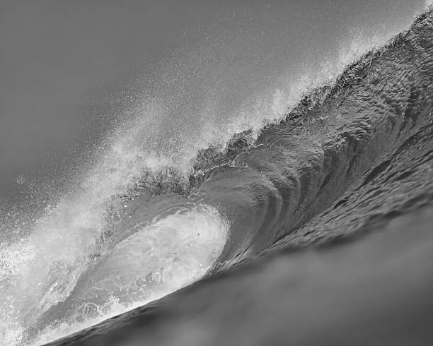 istock Close Perspective Revealing Textured Spray And Foam On Powerful Wave 2250137043