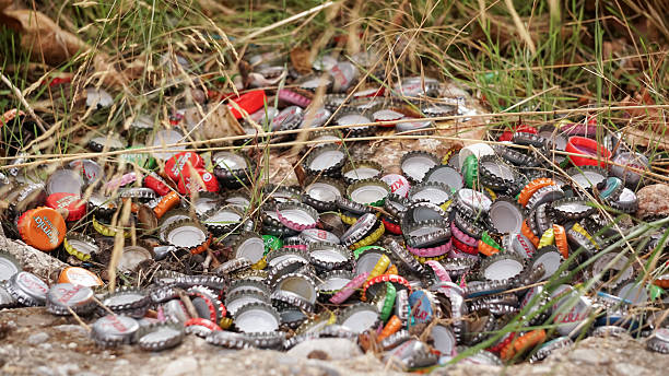 After cleaning the river, River pollution, closeup shopping trolley wheel at garbage dump, background with copy space, full frame horizontal composition