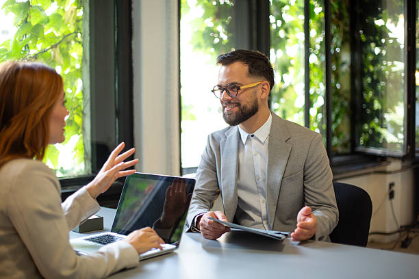 istock Business colleagues discussing work during office meeting 2250143349