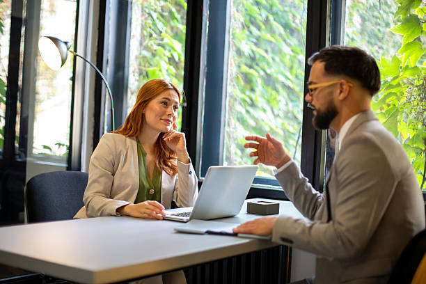 istock Business colleagues discussing project during corporate meeting 2250143757