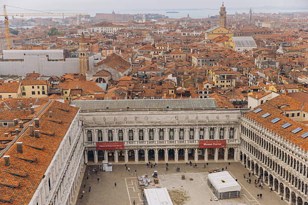 Venice, Italy - February 10, 2024: Aerial view of St. Mark's Basilica and Doge's Palace in Venice from campanile, Italy