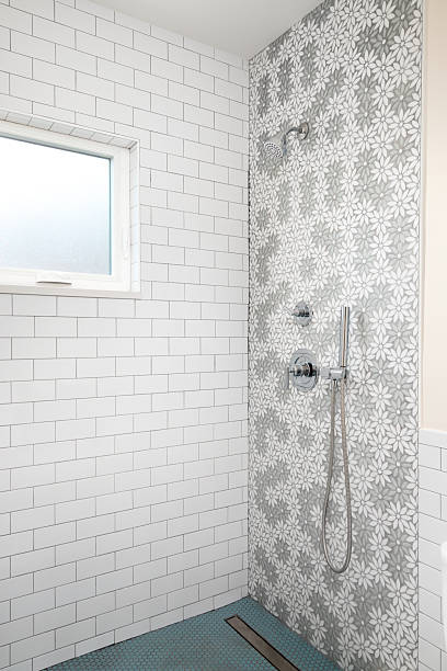 istock A shower with marble flower shaped tiles. 2250145209
