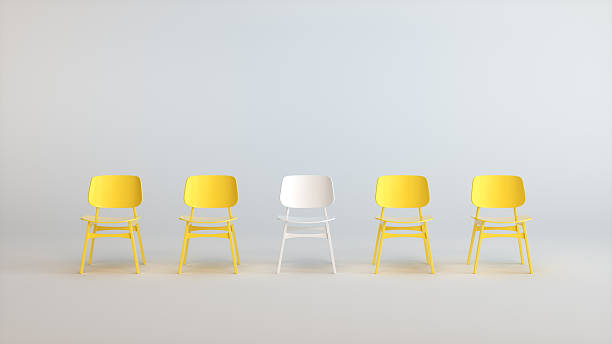 istock Minimal 3D Row of Yellow Chairs with Single White Standout Seat in Bright Studio 2250146068