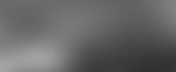 istock Noisy gradient metal gray matte grainy pearl grey blurred abstract monochrome plain background 2250155415