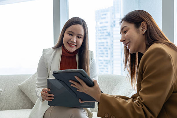 istock Businesswomen discussing strategy in modern office 2250158830