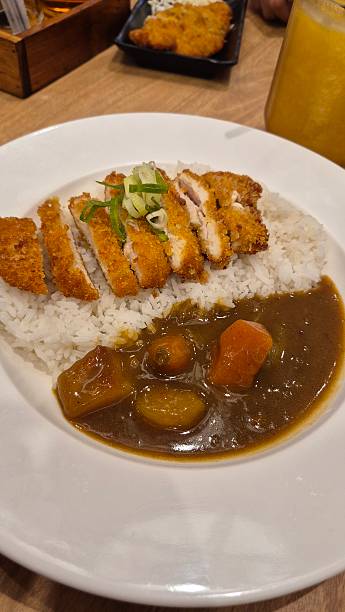 Japanese Chicken Katsu Curry with Rice Served in Restaurant