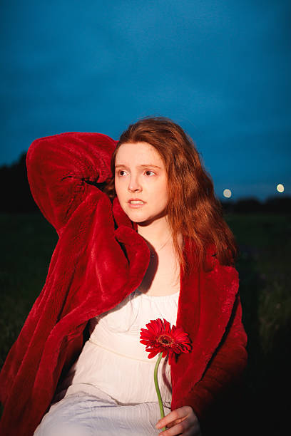 Portrait of a young woman with sunset light hitting her face