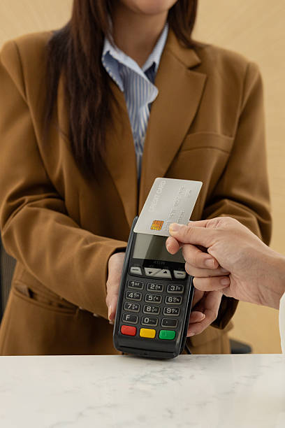 istock Credit card contactless payment at terminal 2250161041