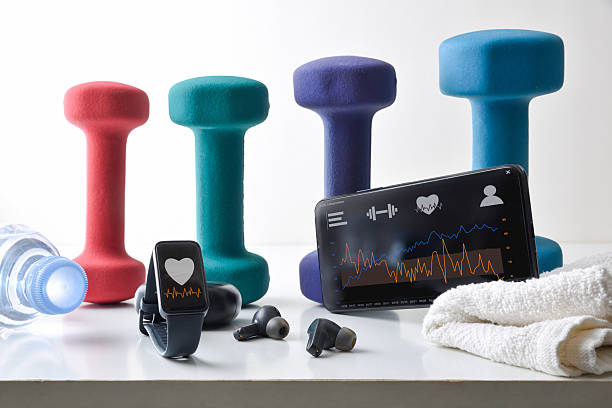 istock Concept sports activity tracking apps on devices with equipment 2250163157