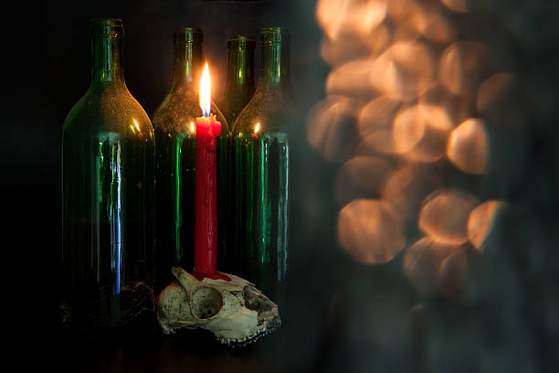 Between dusty wine bottles rests an animal skull, a red candle dripping on its surface. Flickering, mystical lights cast eerie shadows, deepening the dark and haunting atmosphere.