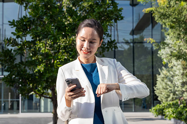 istock Businesswoman using voice command on smartphone 2250165456