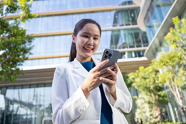 istock Businesswoman using voice command on smartphone 2250165572