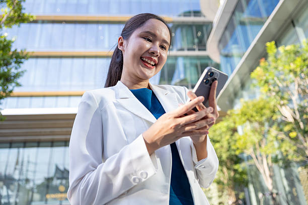 istock Businesswoman using voice command on smartphone 2250165581