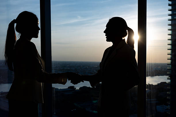 istock Close-up of business handshake in bright office 2250166038