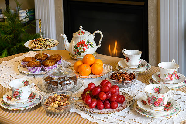 Bakings , nuts, and fruits on mid century English fine bone china plates, with rose pattern tea set.