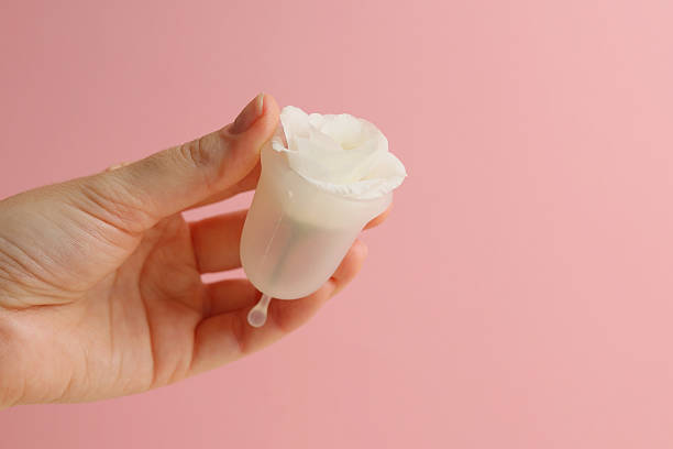 istock EcoFriendly Sustainable Menstrual Cups in a Pouch on a Bright Background 2250167359
