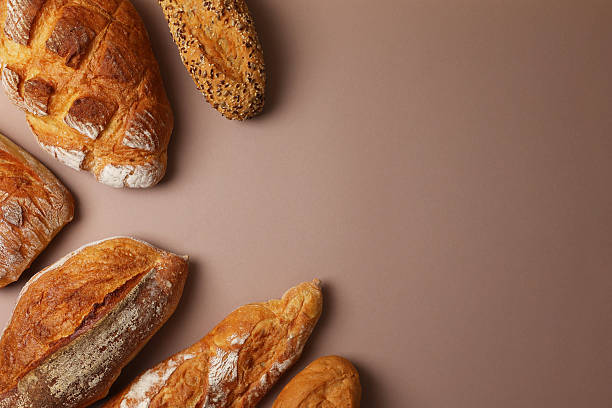 A delightful variety of Fresh Breads, beautifully displayed against a bright background