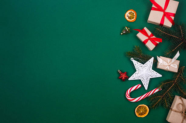 istock Christmas background with gift boxes, pine brunches and baubles. 2250169261