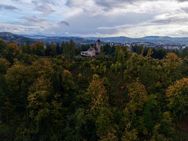 Aerial Forest Panorama With Hilltop Church Surrounded By Autumn Trees And Distant Mountains, Quiet Sanctuary
