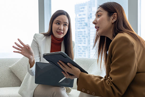 istock Businesswomen discussing strategy in modern office 2250173600